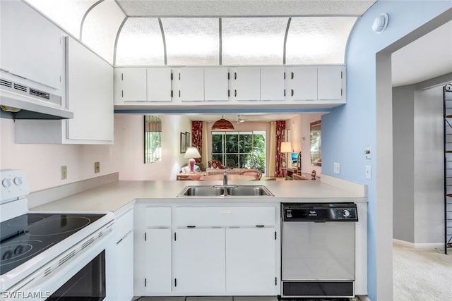 kitchen featuring electric stove, white cabinets, sink, dishwasher, and light carpet