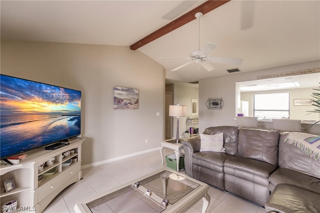 living room with light tile patterned floors, vaulted ceiling with beams, and ceiling fan