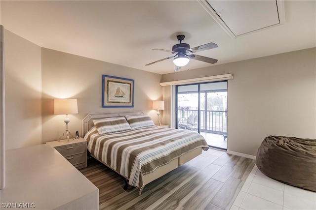 bedroom featuring access to exterior, light hardwood / wood-style flooring, and ceiling fan