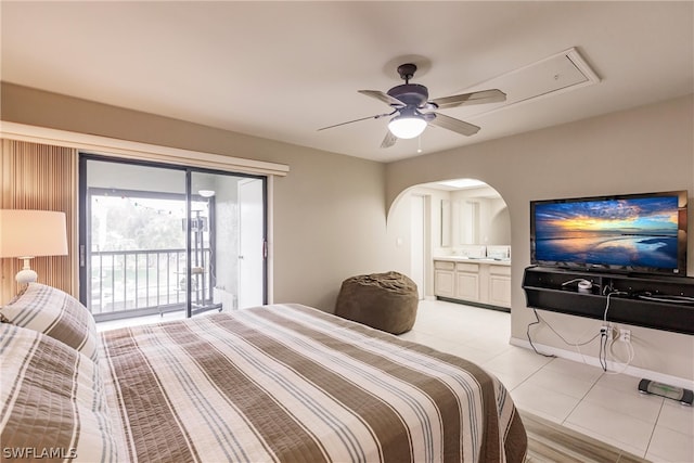 bedroom with access to outside, ceiling fan, sink, light tile patterned floors, and connected bathroom