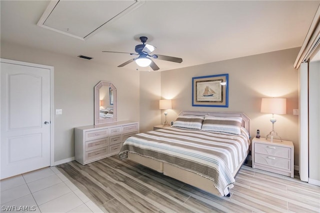 bedroom featuring light hardwood / wood-style floors and ceiling fan