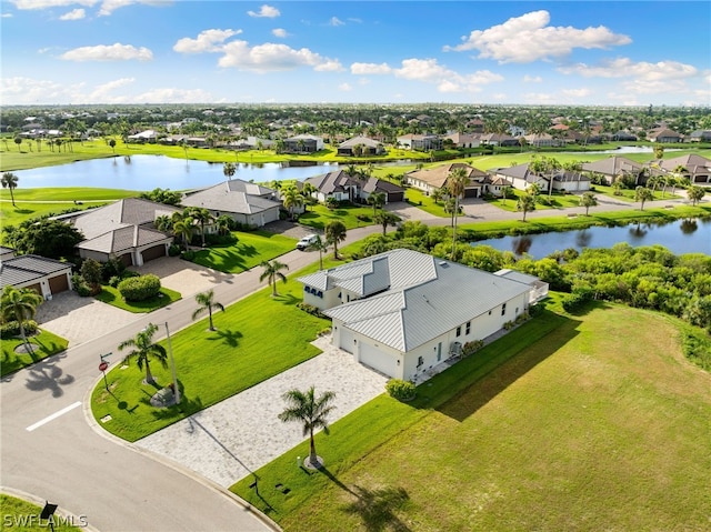 drone / aerial view featuring a water view