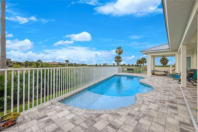 view of pool with a patio area