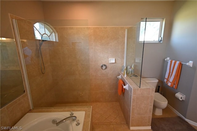 bathroom with tile patterned flooring, plus walk in shower, and toilet