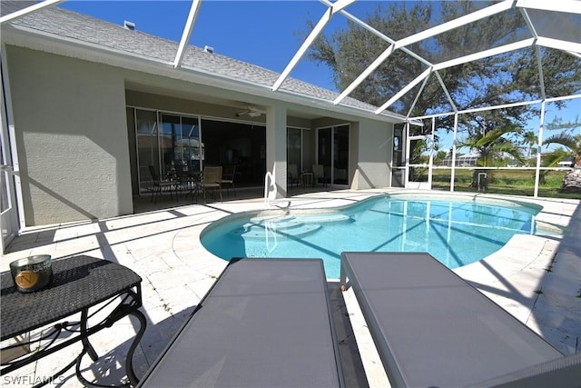 view of pool with a lanai and a patio area