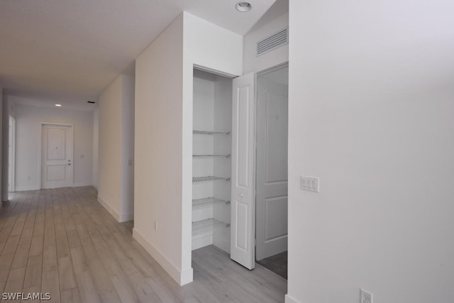 hall featuring light hardwood / wood-style flooring