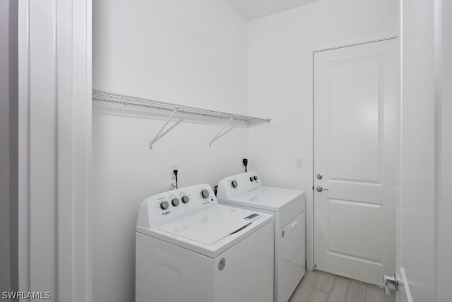 laundry area with washer and clothes dryer