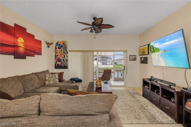 tiled living room featuring ceiling fan