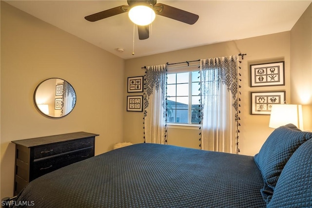 bedroom featuring ceiling fan