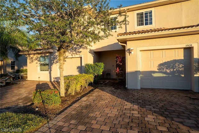 view of front of home with a garage