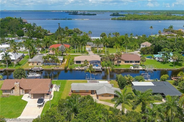 birds eye view of property featuring a water view