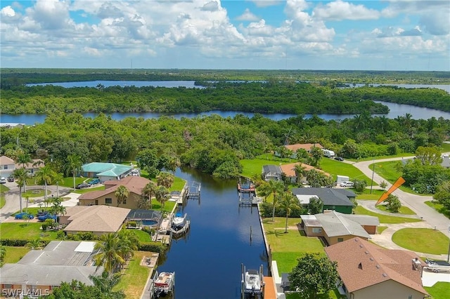 birds eye view of property featuring a water view