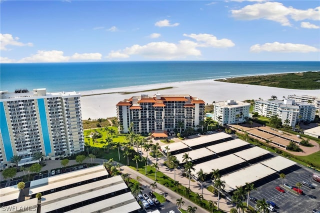 bird's eye view with a view of the beach and a water view