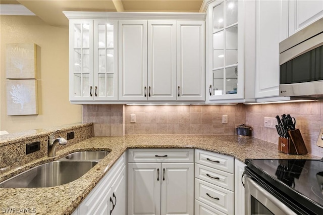 kitchen featuring white cabinetry and stainless steel appliances