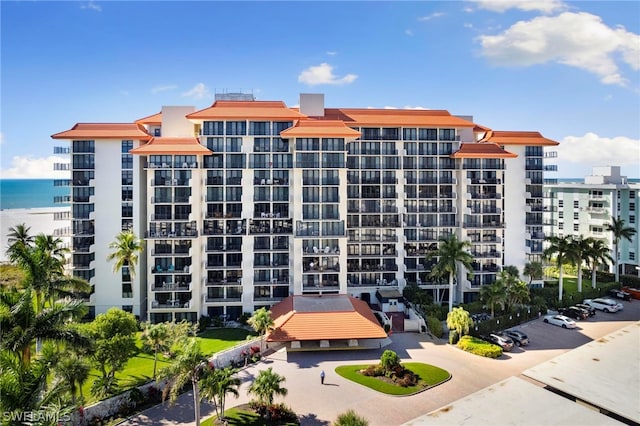 view of building exterior featuring a water view