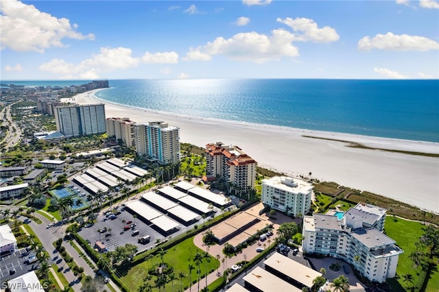 bird's eye view with a view of the beach and a water view