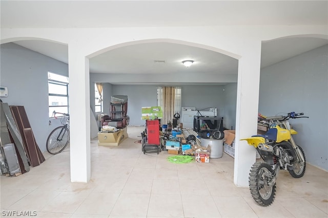 rec room with tile patterned floors