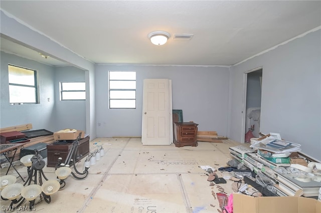 misc room with ornamental molding