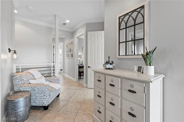 living area featuring crown molding and light tile patterned flooring