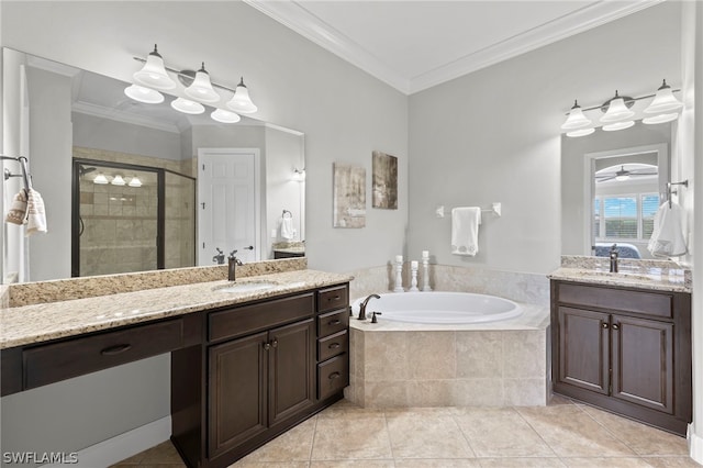 bathroom featuring tile patterned floors, vanity, ornamental molding, and independent shower and bath