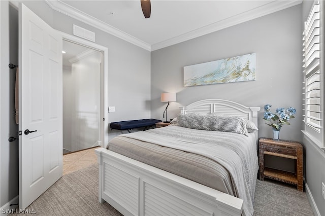 tiled bedroom featuring ceiling fan and crown molding