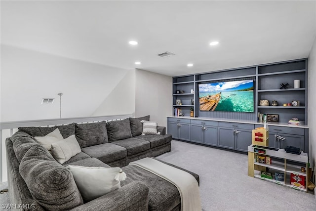 carpeted living room featuring built in features