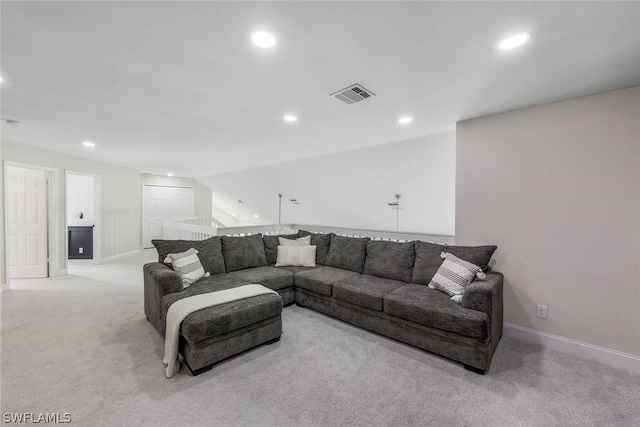 living room with baseboards, visible vents, lofted ceiling, recessed lighting, and light carpet