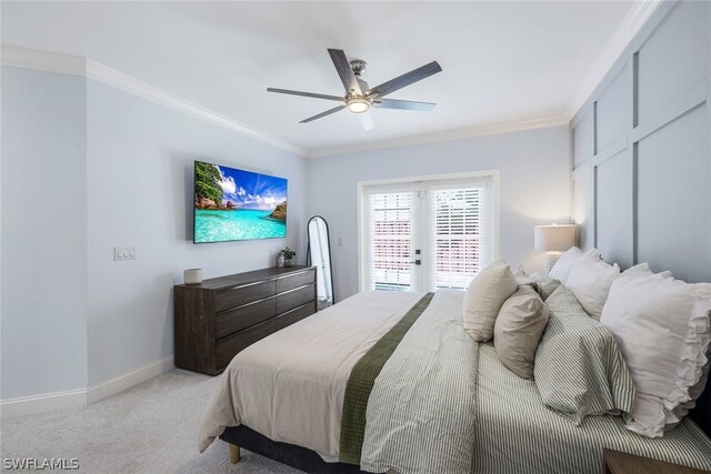 bedroom featuring access to outside, crown molding, baseboards, light colored carpet, and ceiling fan