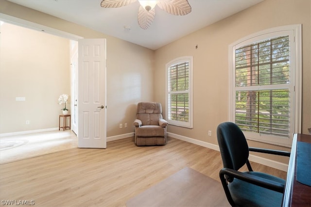 office featuring light wood-type flooring and ceiling fan