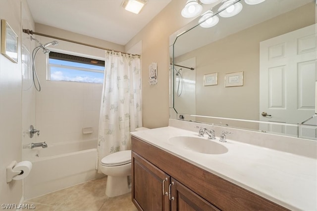 full bathroom with shower / tub combo with curtain, vanity, tile patterned floors, and toilet