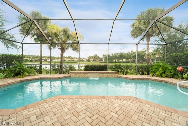 view of pool featuring pool water feature and a lanai