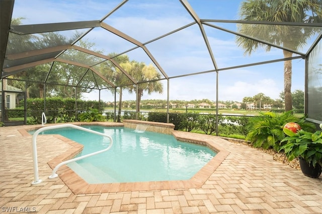 view of swimming pool featuring a patio, pool water feature, and a lanai