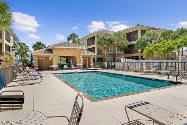 view of pool featuring a patio area