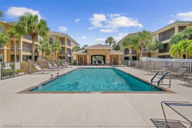 view of swimming pool with a patio area