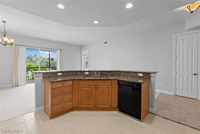 kitchen with sink, black dishwasher, dark stone countertops, pendant lighting, and light colored carpet