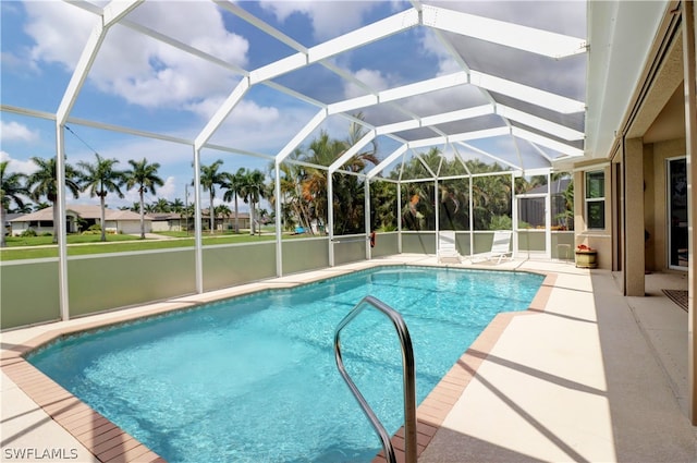 view of pool featuring a lanai and a patio area