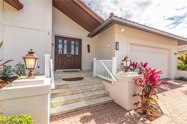 property entrance featuring a garage