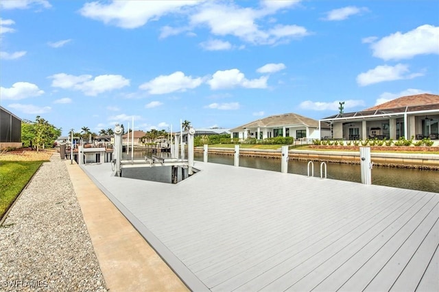 dock area with a water view