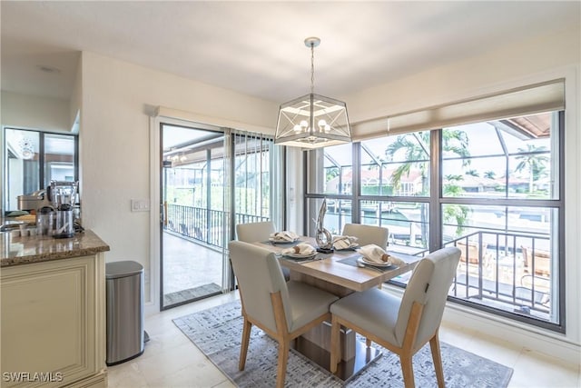 dining area with an inviting chandelier and a wealth of natural light