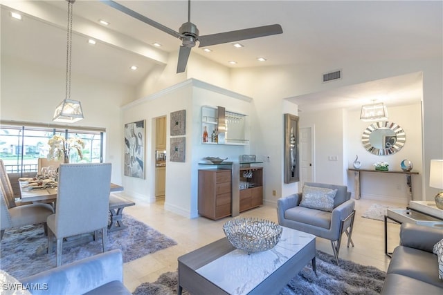 tiled living room featuring beam ceiling, ceiling fan, and high vaulted ceiling