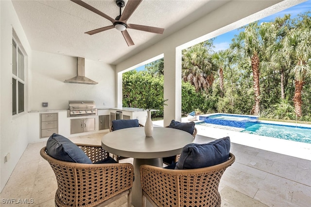 view of patio featuring outdoor dining area, a pool with connected hot tub, grilling area, an outdoor kitchen, and a ceiling fan