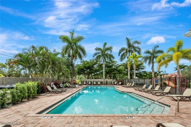 view of swimming pool with a patio area