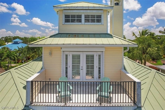 back of property featuring french doors