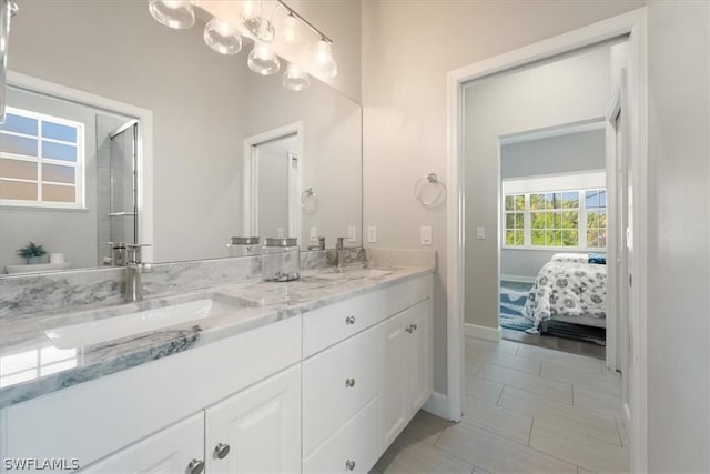 bathroom featuring tile patterned floors and vanity