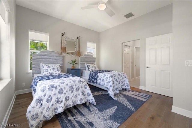 bedroom featuring dark hardwood / wood-style floors and ceiling fan