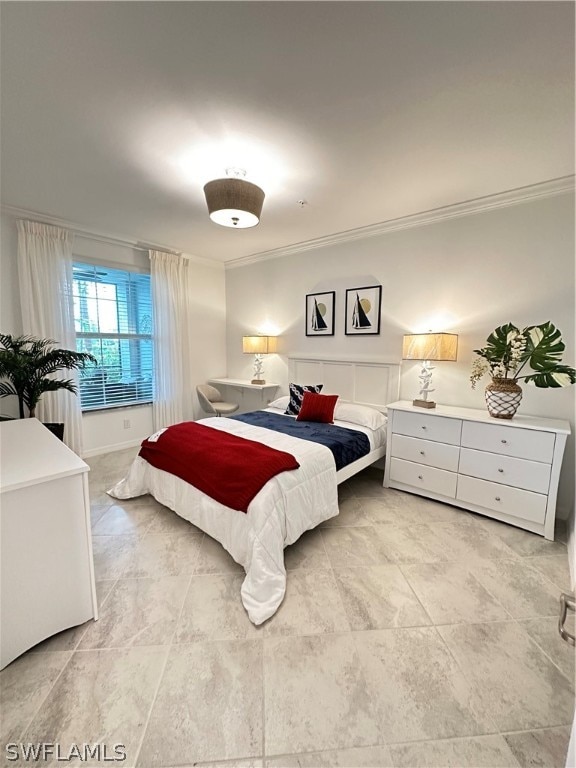 bedroom featuring crown molding and light tile patterned floors