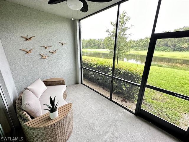 6070 National Blvd Unit 215, Ave Maria, FL 34142 - sunroom / solarium featuring a water view and ceiling fan