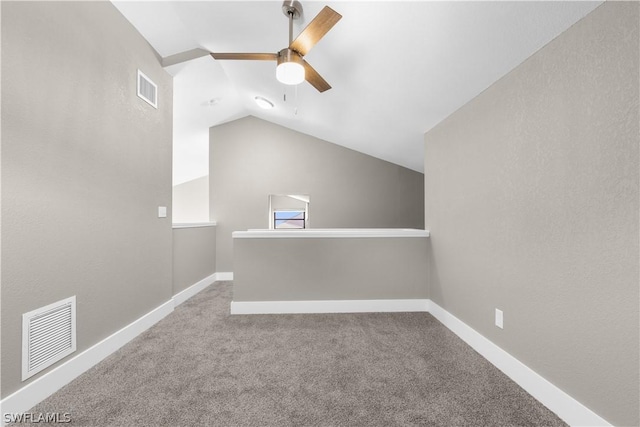 additional living space with ceiling fan, carpet floors, and lofted ceiling