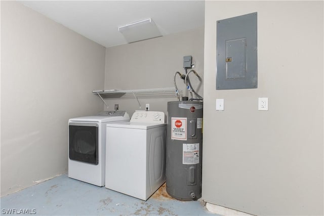 laundry room featuring electric panel, electric water heater, and independent washer and dryer