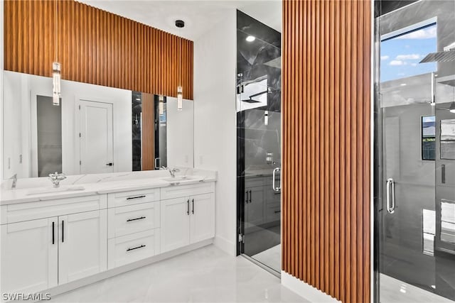 bathroom with vanity, a wealth of natural light, and an enclosed shower